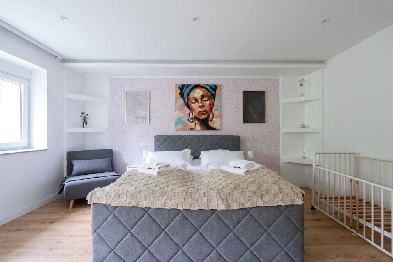 1 bedroom, desk, iron/ironing board, travel crib