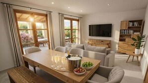 A dining area with a wooden table set for a meal, a television mounted on the wall, and a bookshelf. - Son Roig - Campanet more than a holiday finca (Campanet)