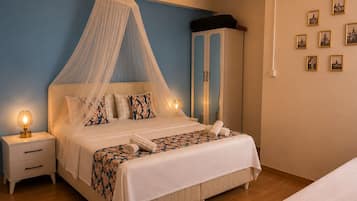 Chambre Triple Deluxe, vue jardin | Wi-Fi gratuit