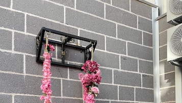 Habitación triple Deluxe, vistas al jardín