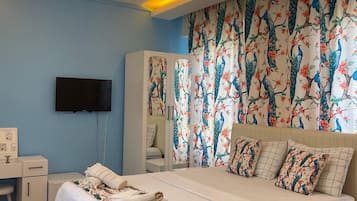 Quarto triplo luxo, vista para o jardim