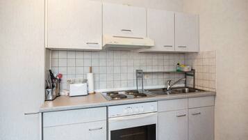 Frigorifero, forno, piano cottura, macchina per tè/caffè