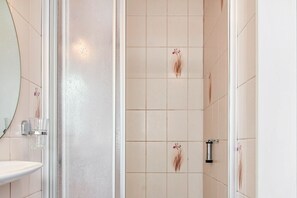 Ducha y secador de pelo