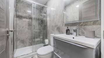 Hair dryer, towels, soap, toilet paper