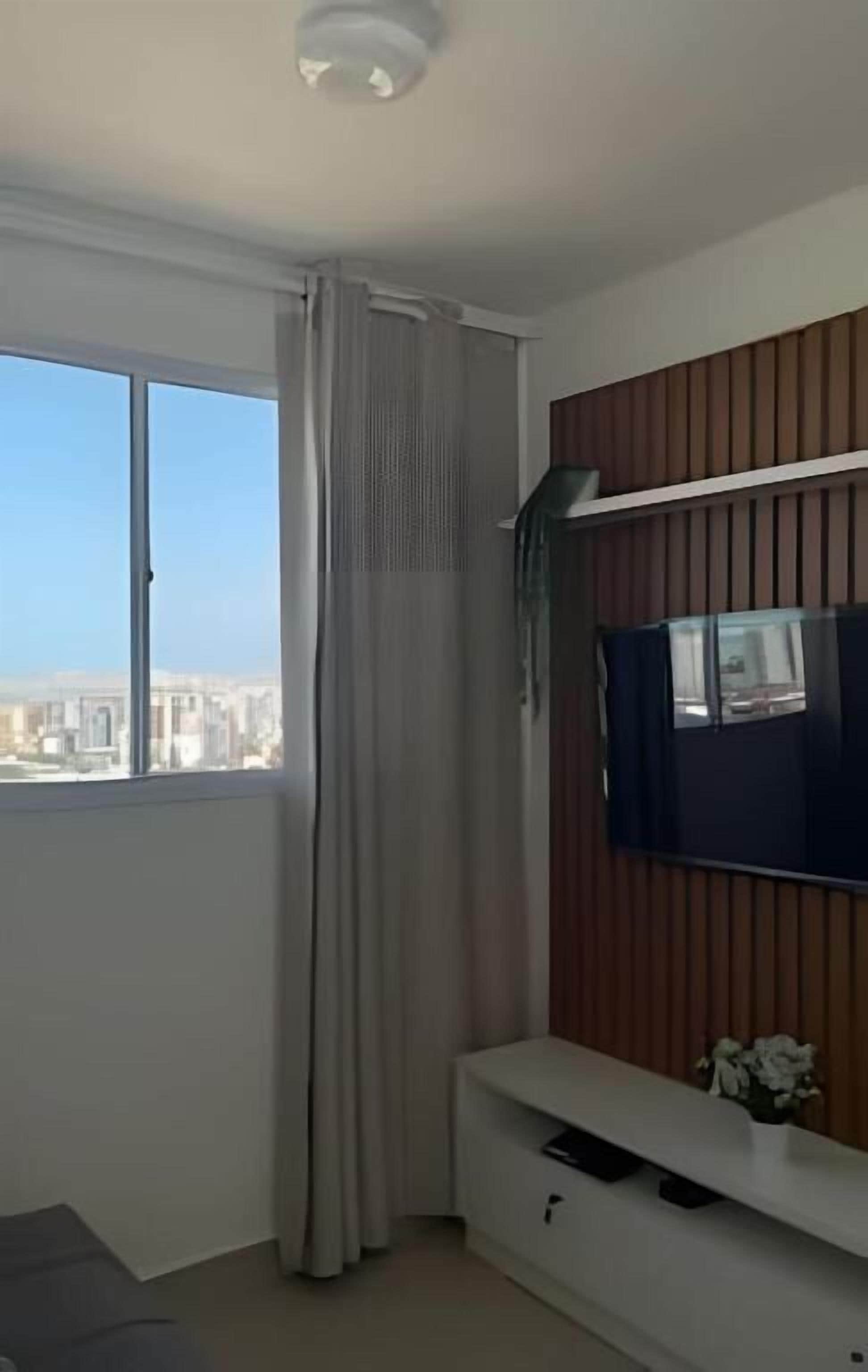 Căn hộ tiện nghi đơn giản, quang cảnh một góc biển | Khu phòng khách