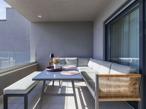 Furniture, Interior Design, Floor, Flooring, Couch, Outdoor Furniture, Living Room, Chair