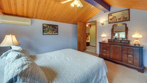 A bedroom with a bed, a ceiling fan, a dresser, and a mirror. - 7 Mi to Sinks Canyon: 'creekside Place' in Lander (Lander)