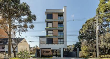 Your Complete Stay in a Building w/ a gym and Garage in Curitiba - Plags