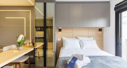 Your Complete Stay in a Building w/ a gym and Garage in Curitiba - Plags