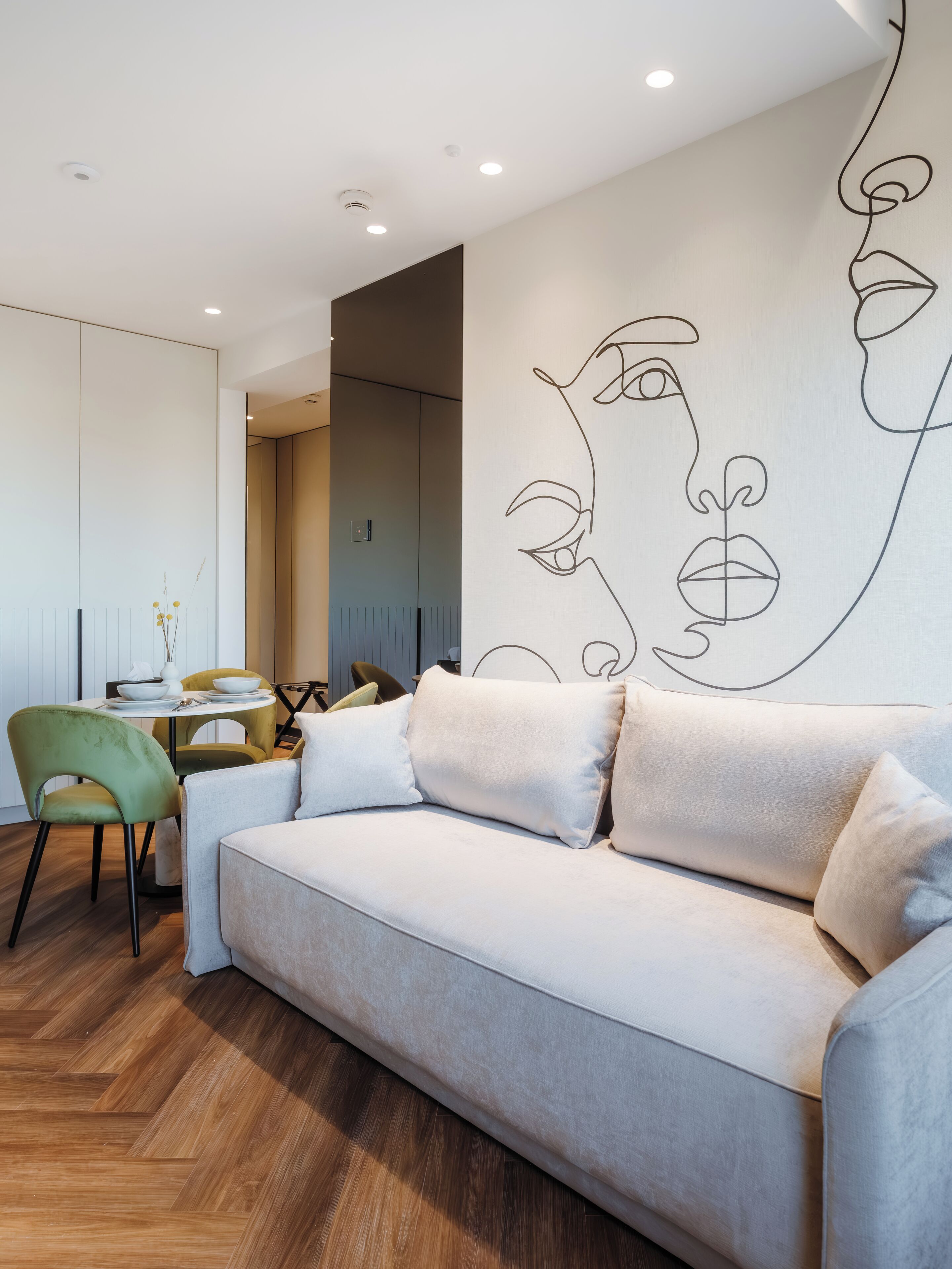 Apartment | Living area | 200-cm flat-screen TV with satellite channels