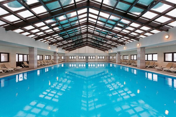 Indoor pool, open 10:00 AM to 10:00 PM, sun loungers, lifeguards on site