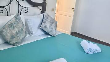 2 habitaciones, tabla de planchar con plancha, wifi y ropa de cama