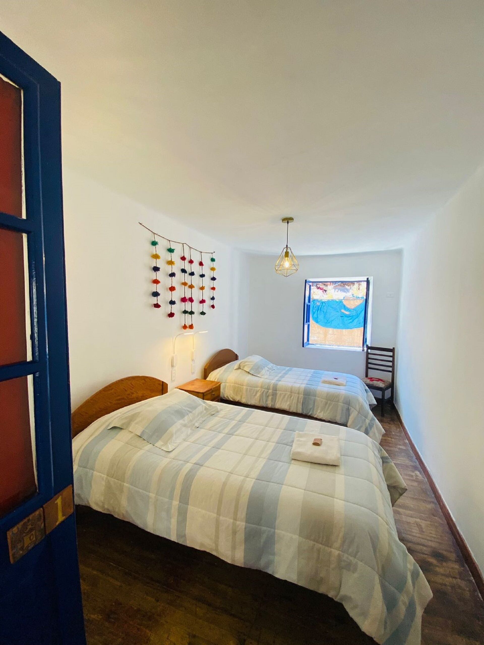 Basic Twin Room, Non Smoking, Shared Bathroom | Free WiFi