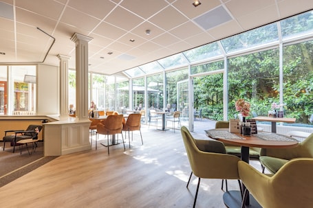 Dining. Spacious Family Escape — Indoor Pool, Free Parking, and Onsite Fun Included