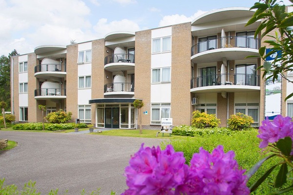 Unwind in a peaceful setting with private balconies and greenery.
