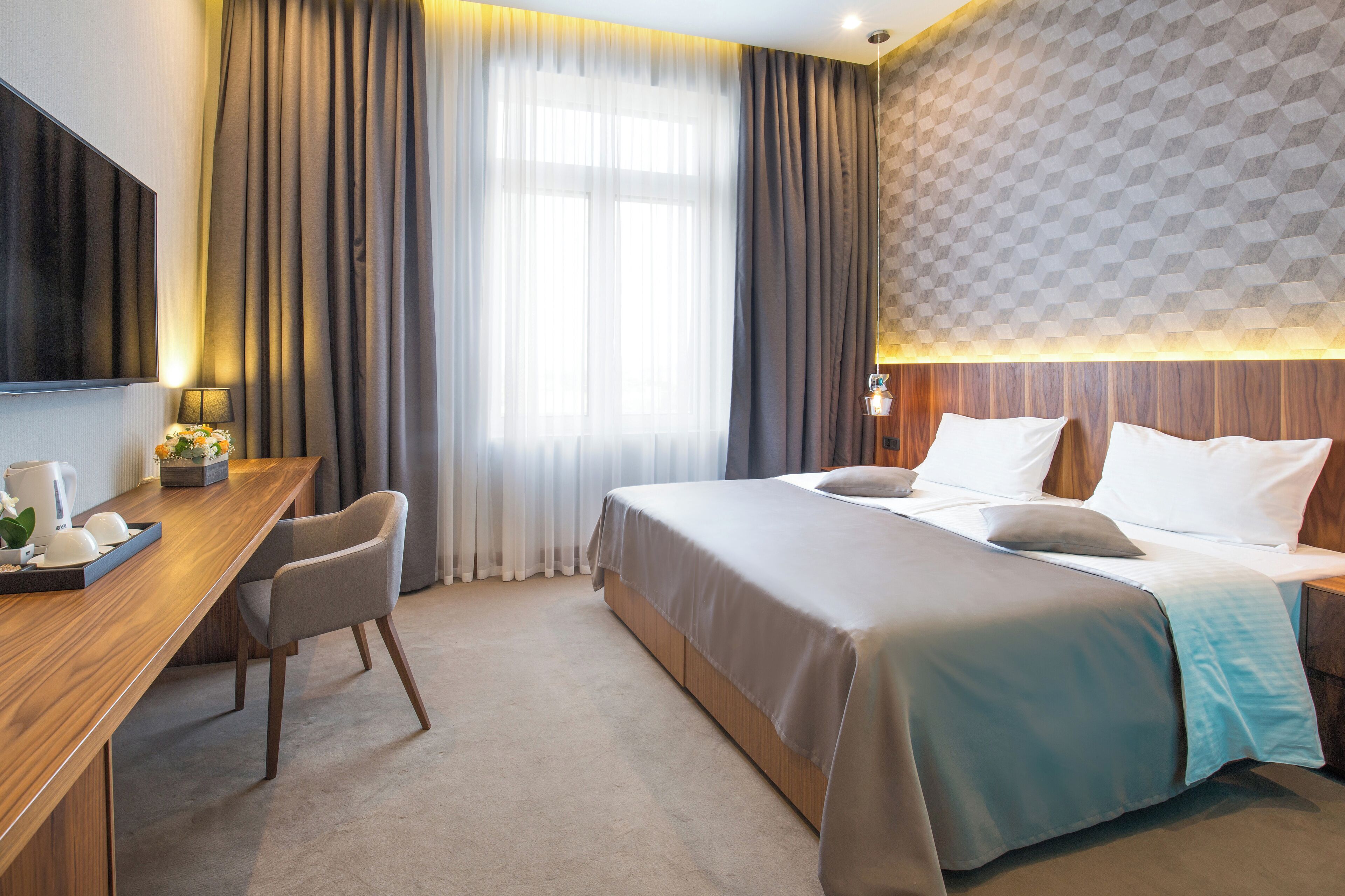 Deluxe Double or Twin Room, City View | In-room safe, laptop workspace, blackout curtains, iron/ironing board