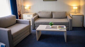 Suite, 1 Schlafzimmer, Stadtblick | Wohnzimmer
