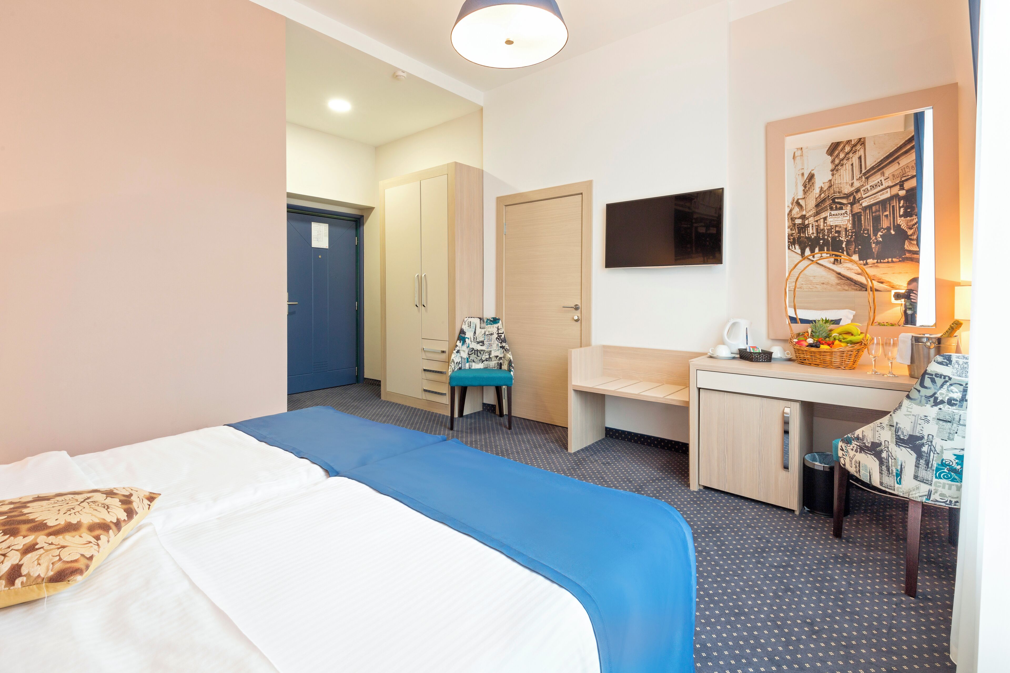 Chambre Deluxe double ou avec lits jumeaux, vue sur la ville | Coffre-fort, espace de travail pour ordinateurs portables