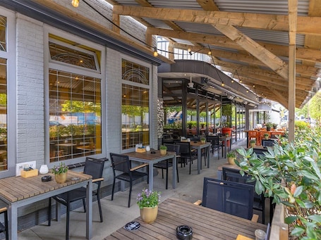 Outdoor dining. Culture-Filled Stay Close to Breda’s Buzzing Center & Nature GetawayDouble room