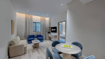 Deluxe Room, 1 King Bed (Separate Living & Dining Area) | Living area