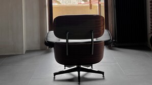 A modern room with a large window, a chair, and a radiator. - hellofrom Tobacco Warehouse (Kavala)