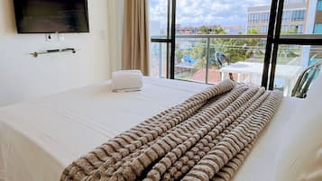 Apartamento panorâmico | Ferros/tábuas de passar roupa, Wi-Fi de cortesia
