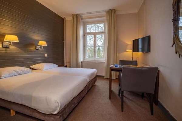 Unit with 2 Single Beds. Exact unit will be assigned upon arrival. Views, colors, and decor may vary.