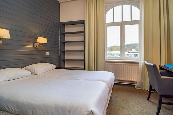 Unit with 2 Single Beds. Exact unit will be assigned upon arrival. Views, colors, and decor may vary.