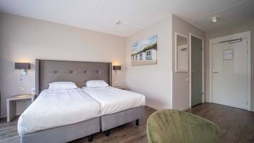 1 slaapkamer, een strijkplank/strijkijzer, gratis wifi, beddengoed