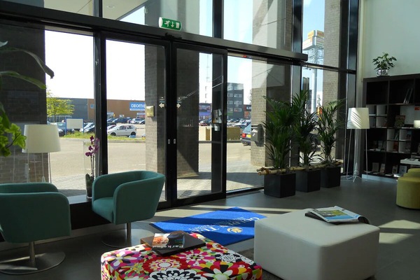 Settle in with a coffee in the airy lounge seating.