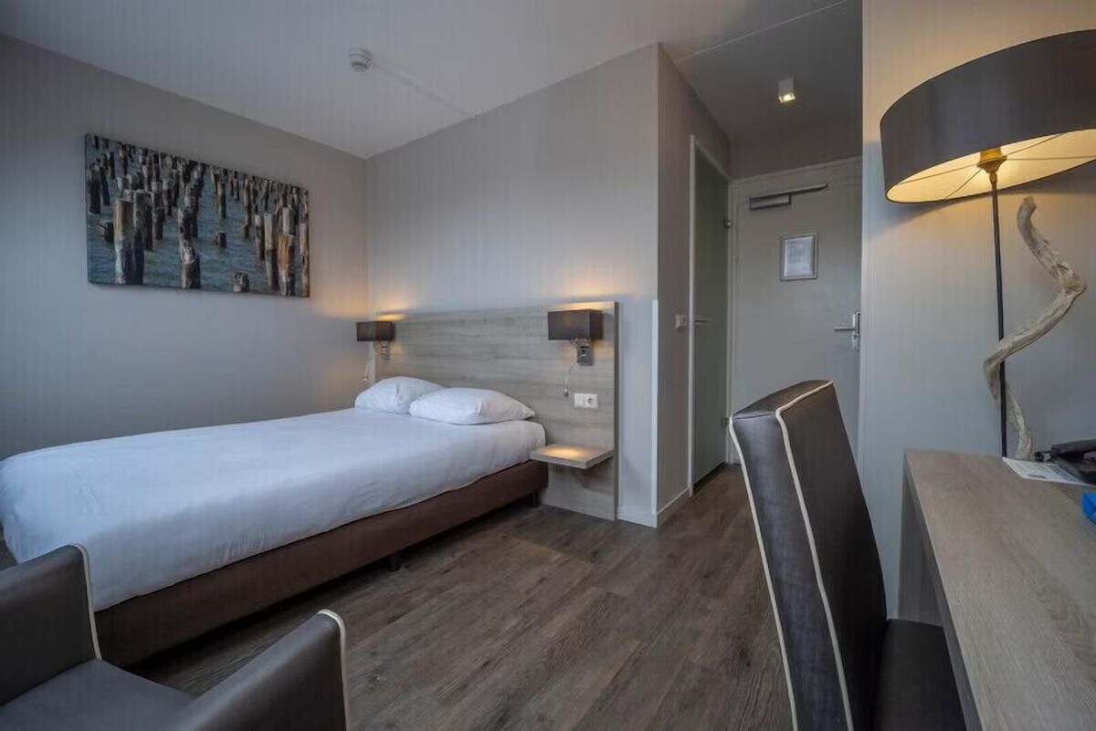 1 slaapkamer, een strijkplank/strijkijzer, gratis wifi, beddengoed