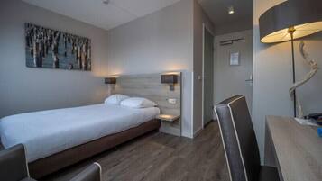 1 slaapkamer, een strijkplank/strijkijzer, gratis wifi, beddengoed