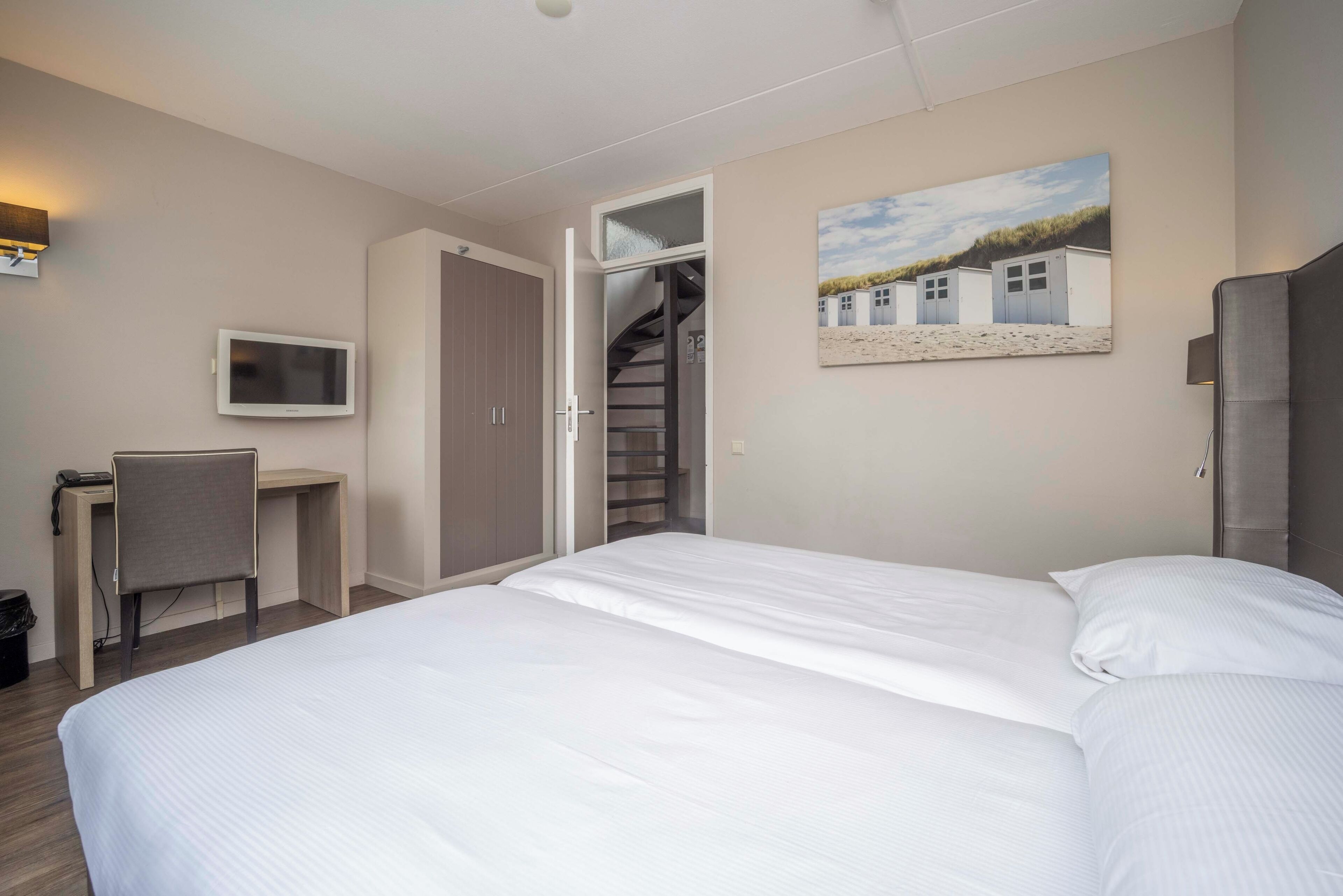 1 slaapkamer, een strijkplank/strijkijzer, gratis wifi, beddengoed