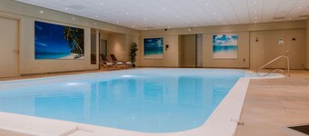 Hillside Comfort in a Green, Quiet Setting! Indoor Pool, Parking!