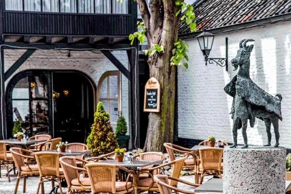 Linger outdoors beside sculptural accents and café-style tables.