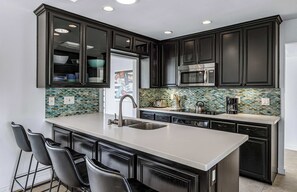 Fridge, microwave, oven, stovetop - Navigate Stays Stylish Poolside Palm Retreat (Palm Springs)
