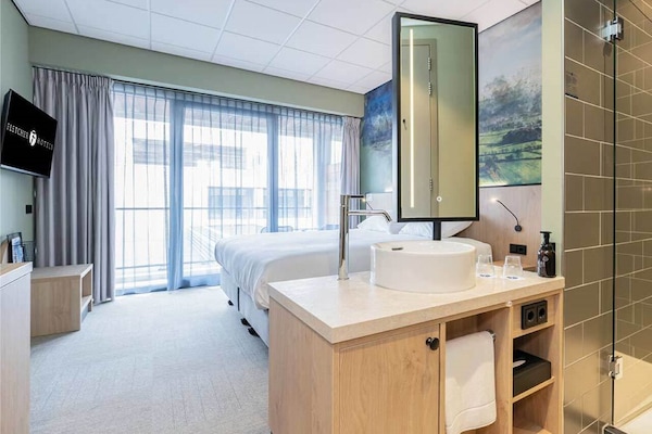 Settle into a spacious suite with open-plan comfort throughout.