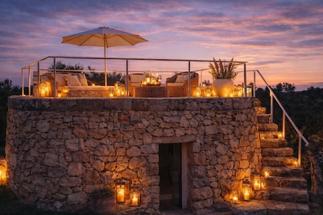 Property grounds. Room 'Tenuta Degli Asinelli - Trullo' with Sea View, Wi-Fi and Air Conditioning