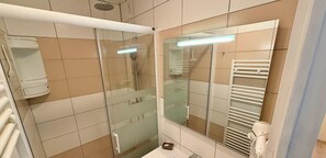 Regadera y secadora de cabello 