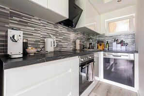 Deluxe Condo, Mountain View | Private kitchen | Microwave, espresso maker, coffee/tea maker, electric kettle - Immensee Appartments by Mainka Properties (Immensee)