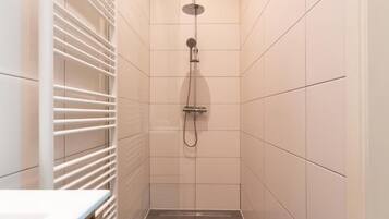 Shower, towels, toilet paper