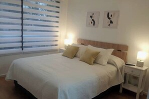 1 habitación, tabla de planchar con plancha, wifi gratis y ropa de cama 