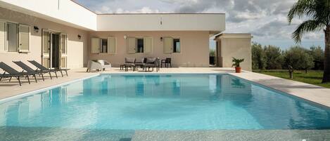 Alberca al aire libre por temporada