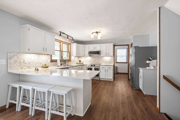 Located upstairs, the open kitchen is well equipped for an unforgettable getaway