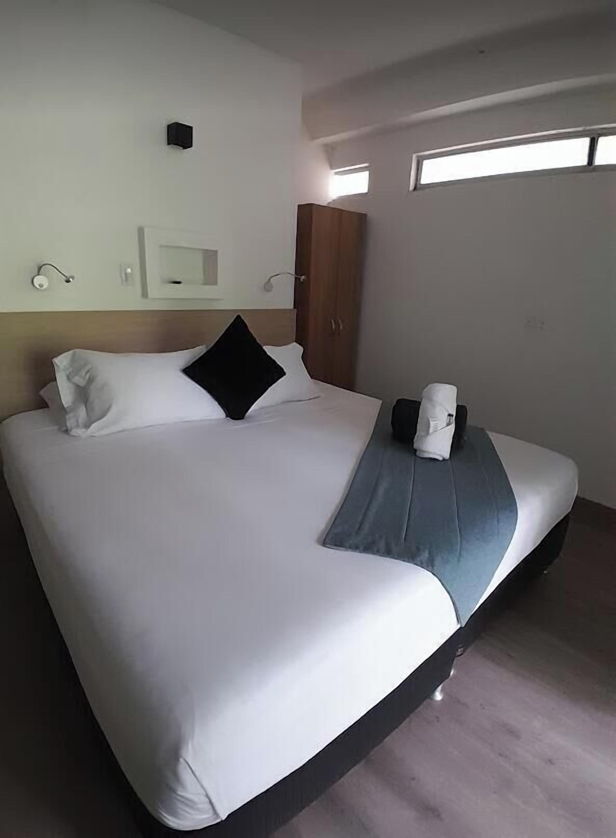 Blackout drapes, iron/ironing board, free WiFi, bed sheets