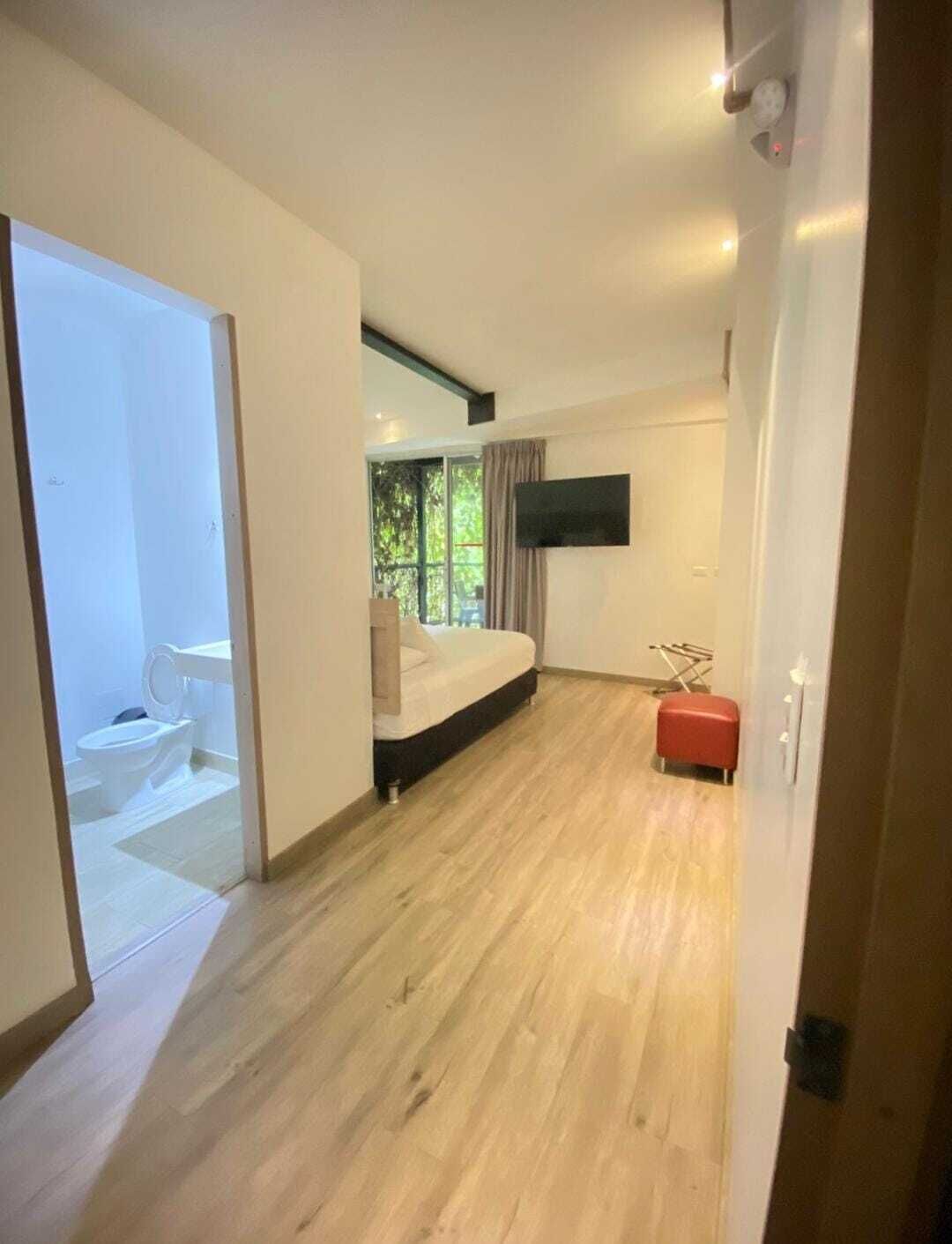 Superior Double Room, Balcony, Garden View | Blackout drapes, iron/ironing board, free WiFi, bed sheets