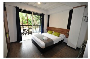 Superior Double Room, Balcony, Garden View | Blackout curtains, iron/ironing board, free WiFi, bed sheets