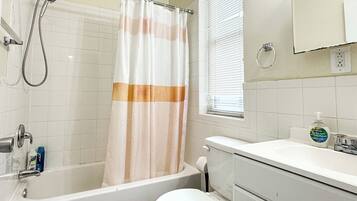 Hair dryer, towels, soap, toilet paper