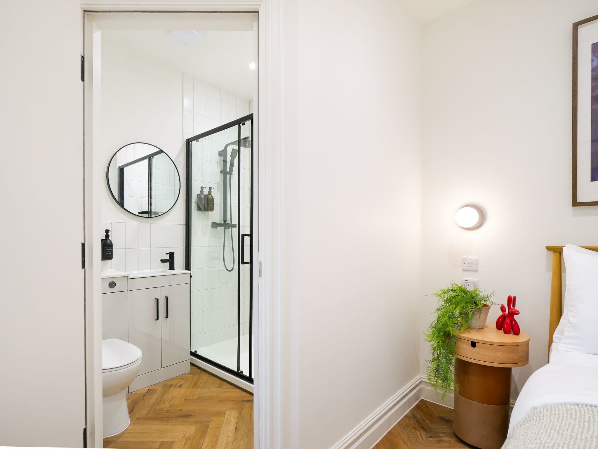 Shower, hair dryer, towels, shampoo