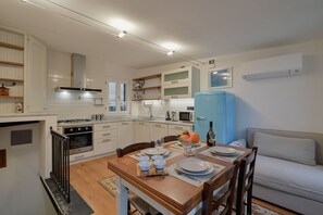 Dining - GuestHost - A cozy 100 square meters apartment, perfect for four people, located between the first and third floors of a typical Cinque Terre townhouse (NO elevator).The property, thanks to a large terrace, enjoys fantastic views of the sea and mountains (Riomaggiore)